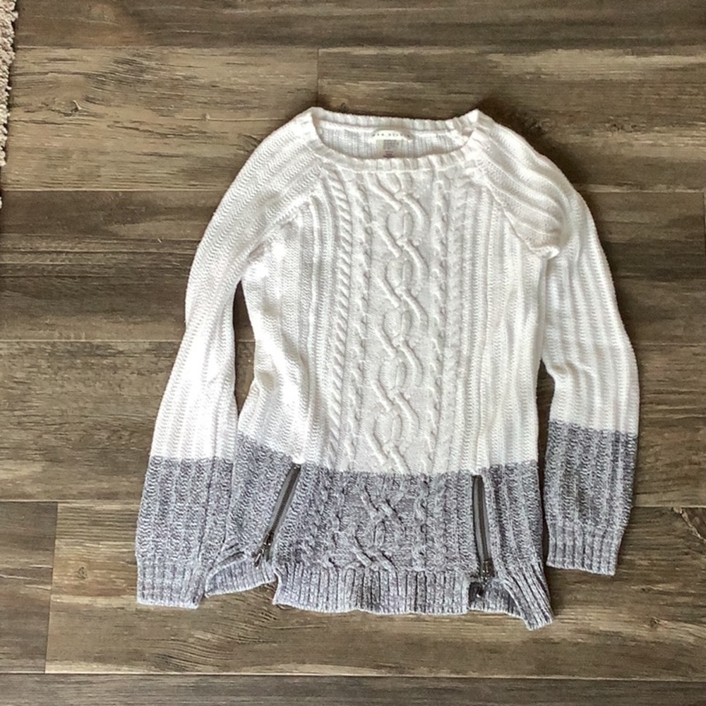 Gray and white sweater